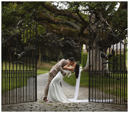 Bride and groom kissing on their wedding day in North Yorkshire