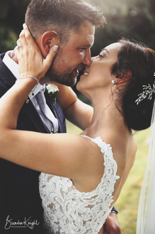 closeup of married couple kissing