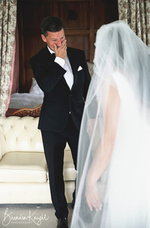 Dads first look at his daughter in her wedding dress